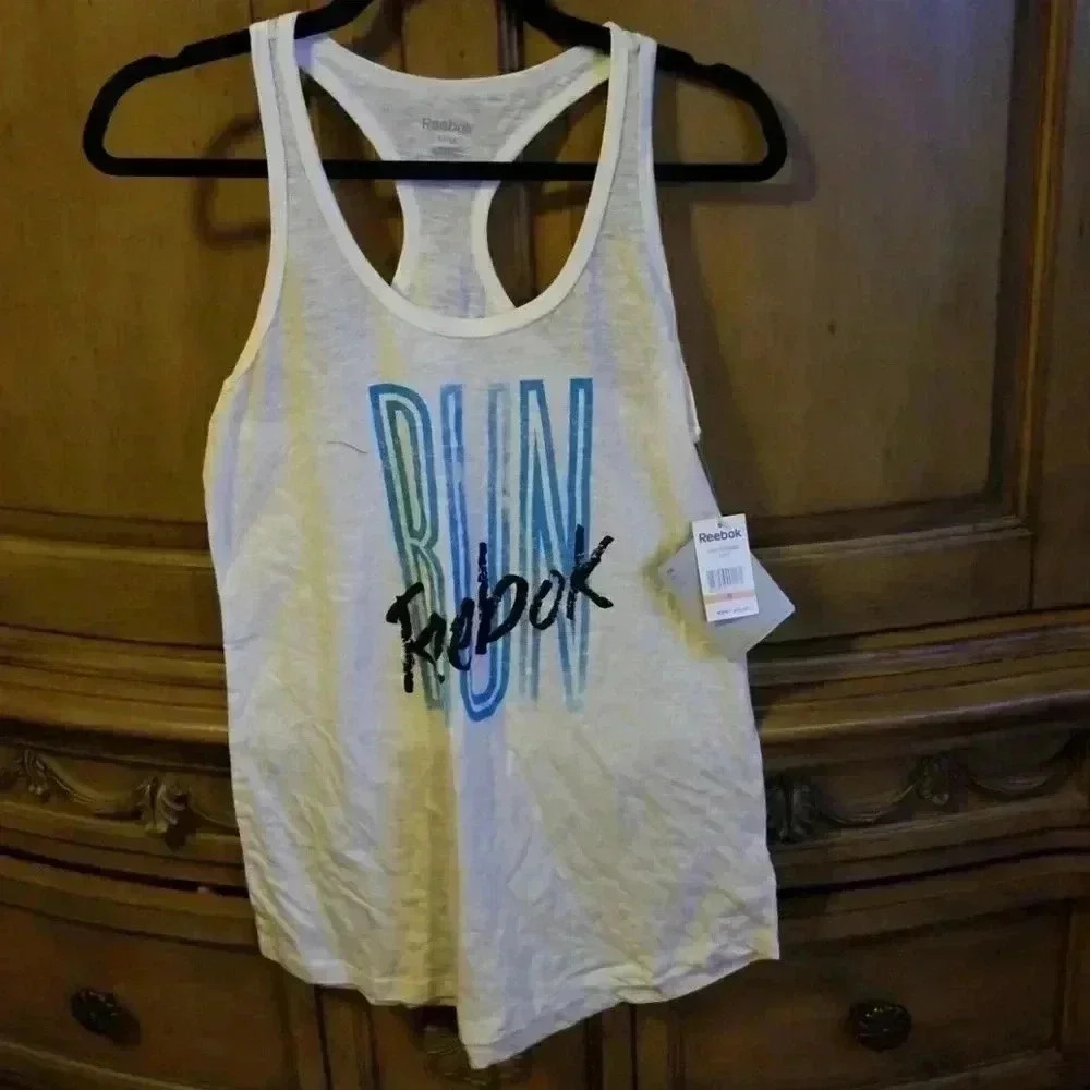 White Reebok tank